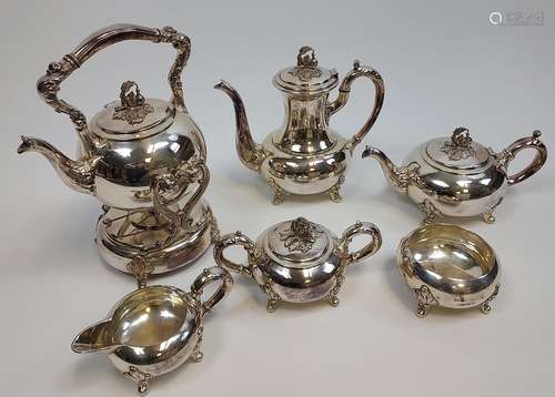 A Six piece silver on copper tea/ coffee service with a spir...