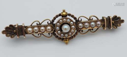 A Victorian Yellow metal bar brooch set with seed pearls. St...