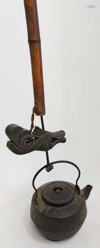 A 19th century Japanese Jizai Kagi Hearth hook with Cast iro...