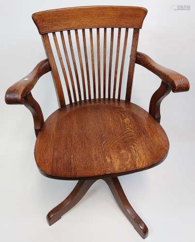 A Nice example of an Antique captains arm chair made from oa...