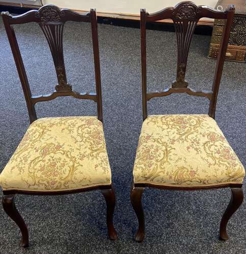 A Lot of two matching 19th century parlour chairs. Both desi...