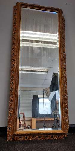 A Heavy 19th century gilt framed full length mirror. [Damage...
