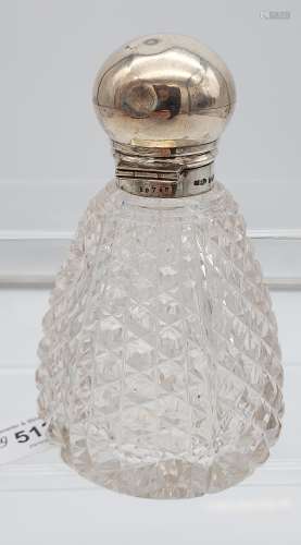A Birmingham silver topped and cut glass base perfume bottle...
