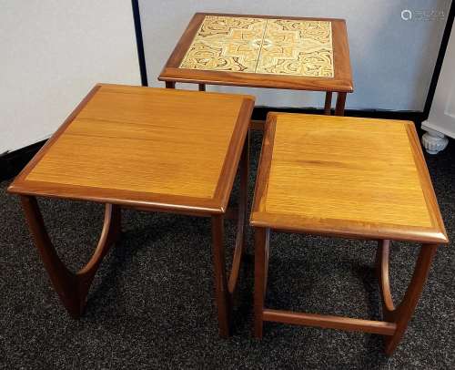 A Mid century tile top nest of three tables. [55x50x50cm]