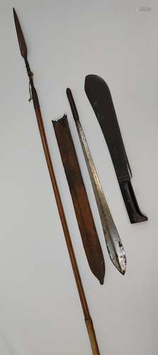 A Lot of three native weapons to include spear, jungle mache...