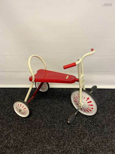 A Vintage childs Raleigh tricycle.