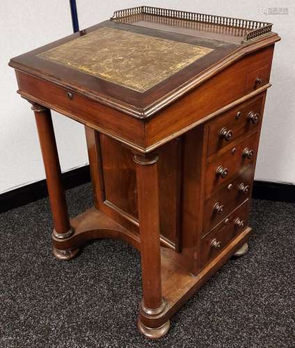 A 19th century Davenport writing desk, designed with a galle...