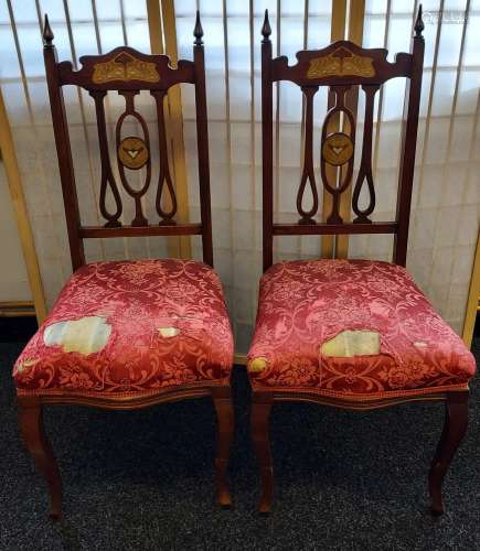 A Lot of two Art Nouveau inlaid dining chairs.