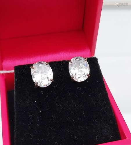 A pair of substantial silver CZ stud earrings [10.0mm in len...