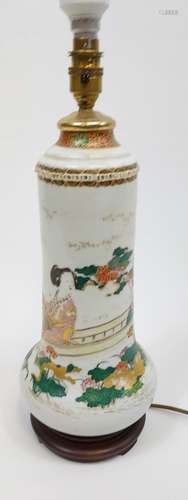 A Chinese hand painted table lamp, signed by the artist.