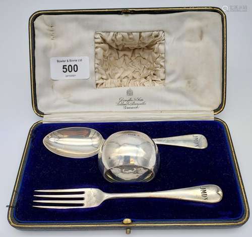 A Boxed London silver three piece Christening set. Fork, spo...