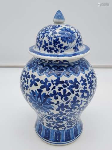 A Japanese/ Chinese blue and white pattern lidded preserve p...