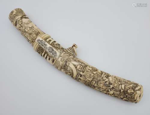 A 19th/ early 20th century highly decorative Japanese Tanto....