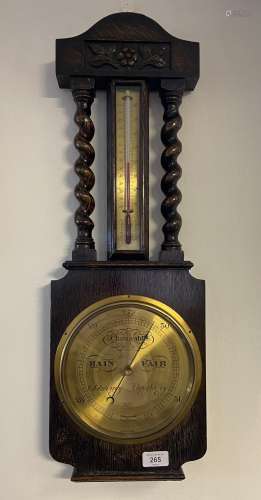 An Antique Rattray Dundee brass face wall barometer. Fitted ...