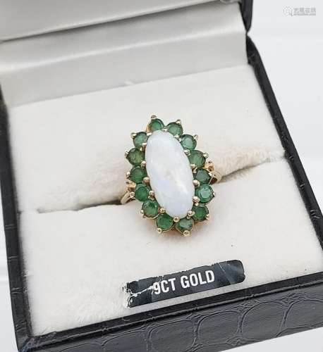 A Beautiful example of a ladies 9ct gold, large opal and eme...