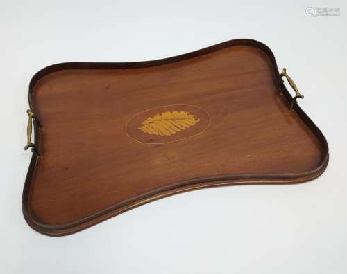 A Georgian serving tray with marquetry shell inlay and brass...