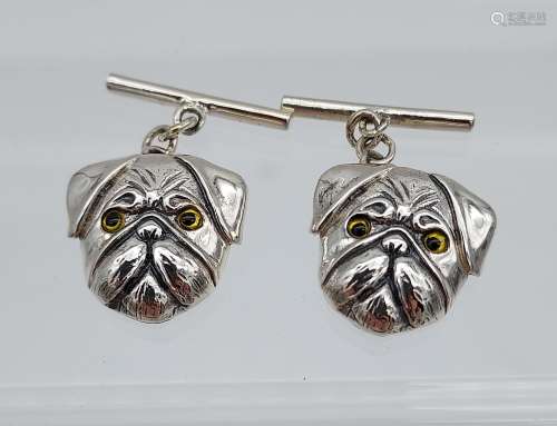 A pair of silver dogs head cufflinks [4.43g]