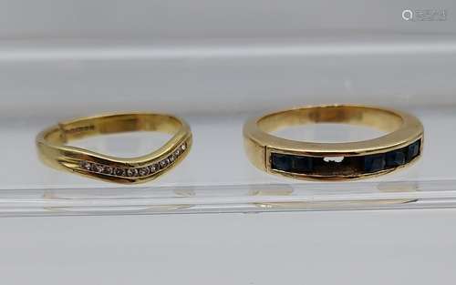 A Lot of two scrap gold 9ct gold rings. Contains diamond clu...