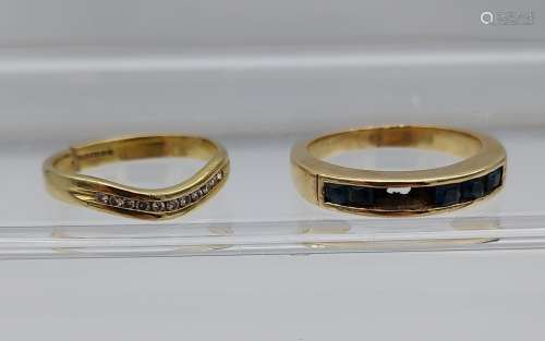 A Lot of two scrap gold 9ct gold rings. Contains diamond clu...