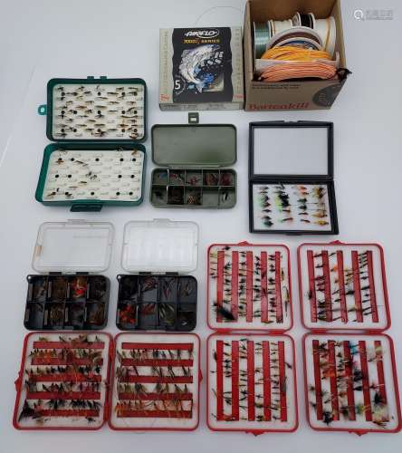 A large selection of fishing flies, fly boxes and fly line.