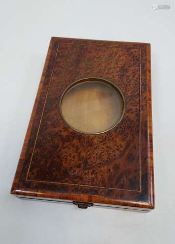 Antique Burr Walnut box with encased magnifying glass. [4x13...