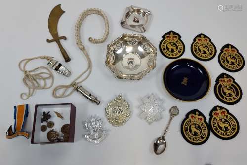 A Selection of military items to include cap badges, patches...
