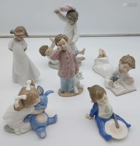 A Lot of six Nao figurines to include children in night gown...