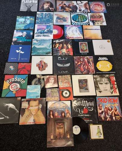 A Collection of mixed genre records to include Skid Row, Whi...