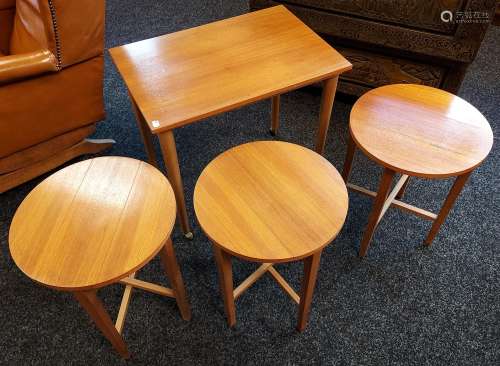 A Mid century side table with three pull out serving tables....