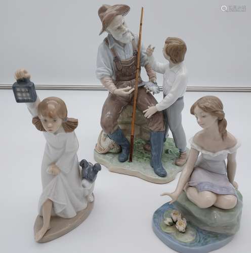 Three various Lladro and Nao figurines to include BM17A and ...