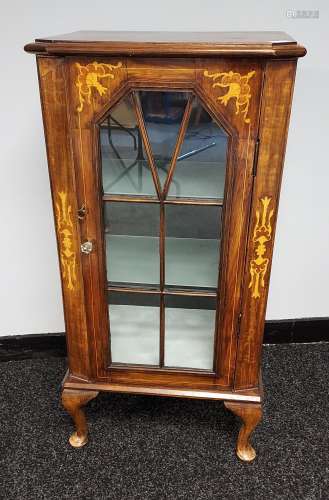 A Victorian inlaid walnut music cabinet. Fitted with later Q...