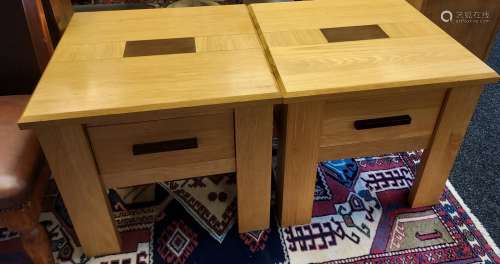 A Pair of contemporary solid oak bedside cabinets