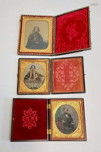 Three various Daguerreotypes photographs fitted within ornat...