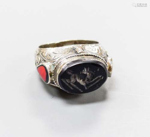 A continental engraved white metal and oval intaglio black o...