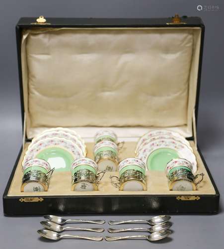 A set of six Aynsley coffee cans and saucers, with silver ho...