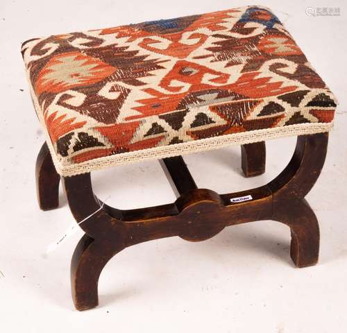 A Victorian beech 'X' framed stool with Kelim seat, length 4...