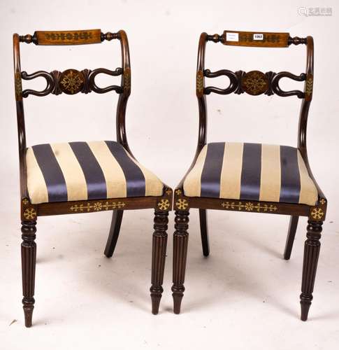 A set of six Regency brass inset simulated rosewood dining c...