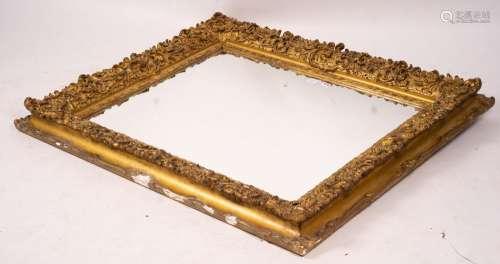 An ornate Victorian giltwood and gesso rectangular wall mirr...