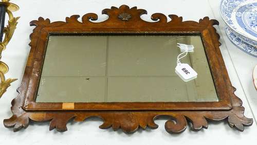 A walnut fret cut wall mirror48x52cm