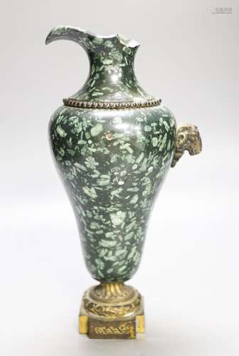 An ormolu mounted green fossil marble ewer, (a.f.)29cm