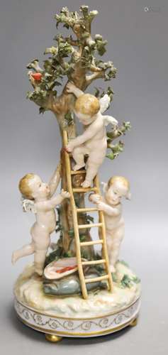 A German porcelain Meissen style group of amorini, climbing ...