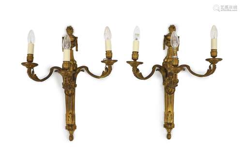 A pair of Louis XVI style ormolu three branch wall lightswit...