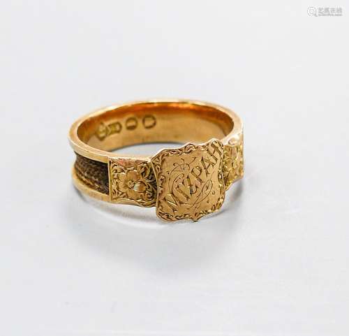 A late Victorian engraved 12ct gold Mizpah mourning ring, wi...