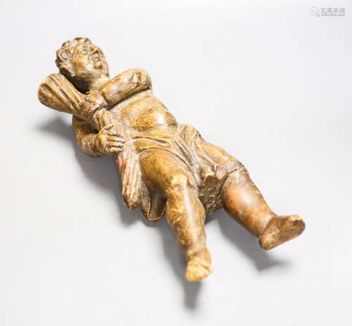 An Italian limewood figure of a cherub, 19th century