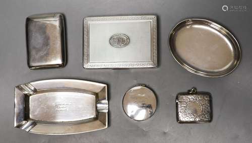 Two silver cigarette cases, largest 10.8cm, a silver vesta c...