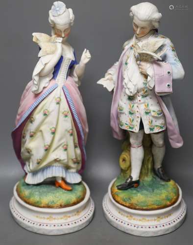 A pair of 19th century French bisque figures of a lady and g...