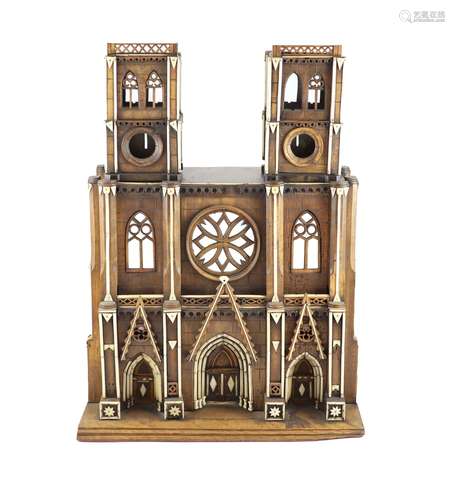 A 19th-century French walnut and ivory model of Notre Dame C...