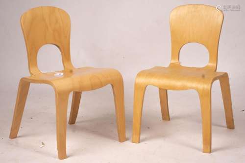 A pair of ‘Comunity’ ergonomic design children’s chairs, 55c...