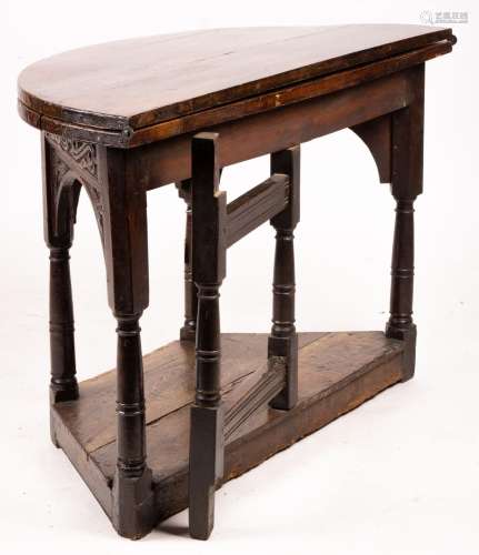 A 17th century oak credence table, width 108cm, depth 52cm, ...
