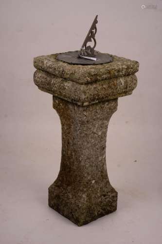 An octagonal sundial on reconstituted stone plinth, height 9...